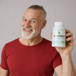 burn slim supplement product held by smiling man red shirt
